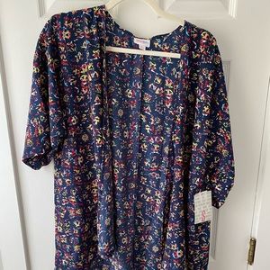 NWT - Small Lularoe Lindsay - Blue with tribal pattern